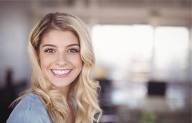 closeup of young woman smiling 