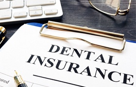 Dental insurance claim form on desk. 