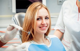 Woman smiling in dental chair