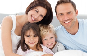 Family smiling after dental care