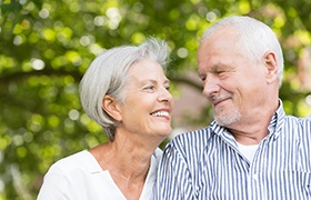 older couple talking to each other 