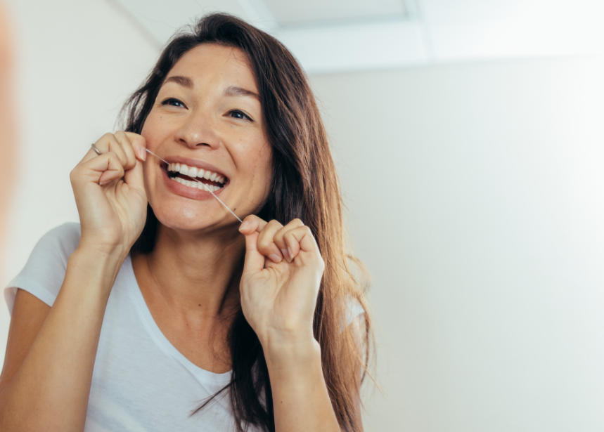 Woman flossing
